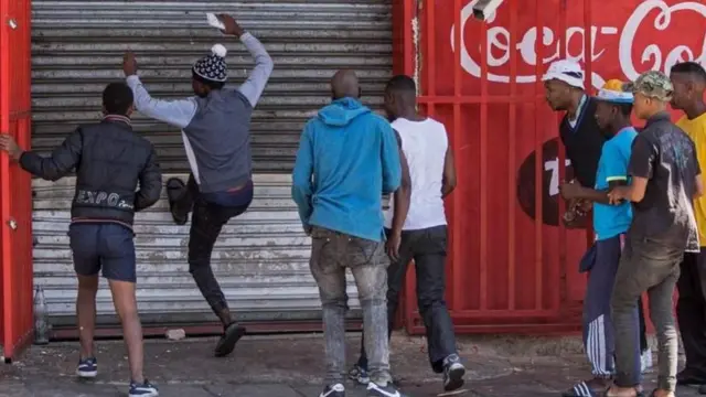 South Africans breaking into a foreign owned business