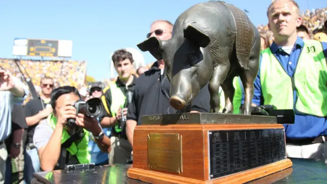 Trofeo con forma de cerdo.