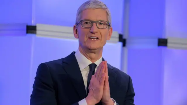 TIM COOK