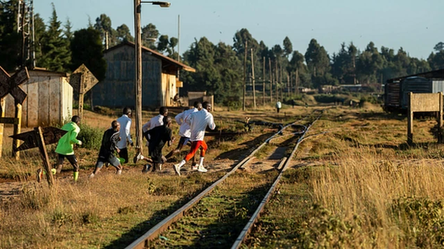 Kipchoge and fellow training partners out running