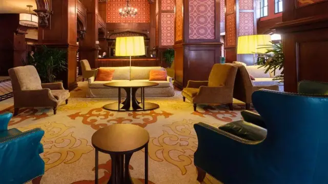 The outline of a tall figure seated on the hotel's chairs appeared on the Ghost Hunting Tools screen