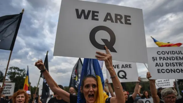 Os símbolos do QAnon estão presentesgrupo telegram aviator f12betvárias partes do mundo, incluindo a América Latina