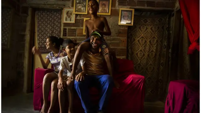 Carlos André dos Santos e família