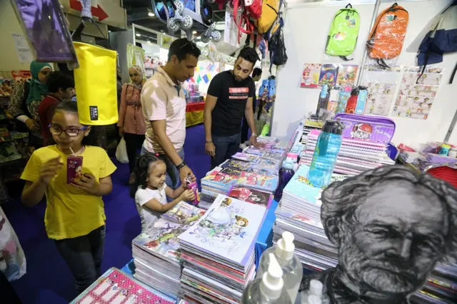 Parents shopping for school supplies at a school supplies fair in Cairo, Egypt, on 28 September 2021. New academic school starts on 9 October 2021.