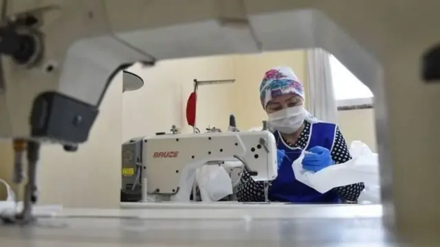 тигүүчү аял