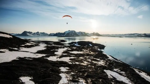 Paragliding over the lonely landscapes of southern Svalbard