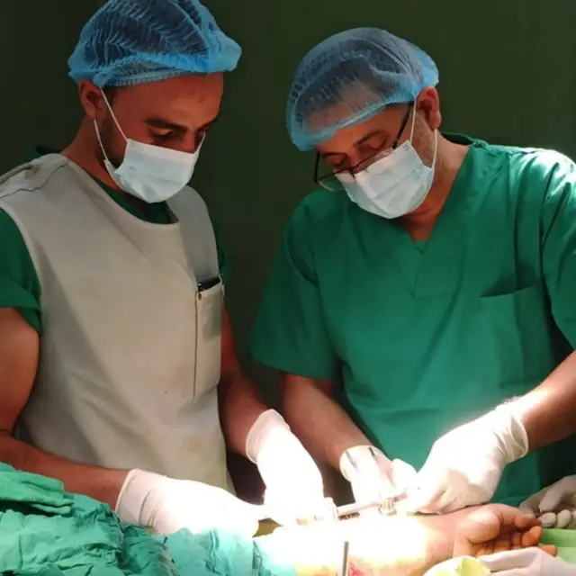 Dr Fadel Naim in an operating on a patient in theatre