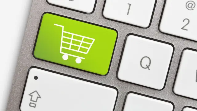 Teclado con una tecla de comprar.