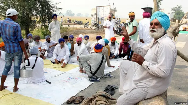 bathinda : The protesters blocked the Bathinda-Kotkapura highway at Behbal Kalan during protest over the sacrilege of Guru Granth Sahib on October 20, 2015