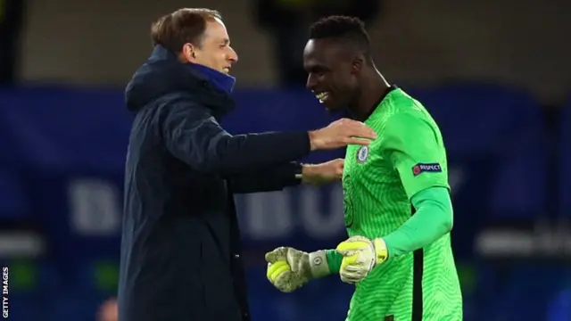 Chelsea manager Thomas Tuchel (left) moves to hug his Senegalese keeper Edouard Mendy