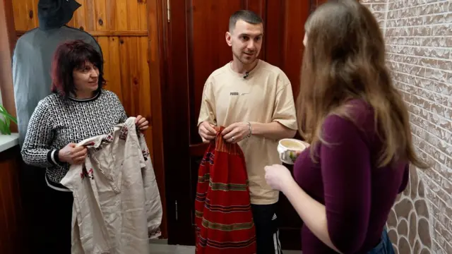 Svitlana and Tima show me their family's folk heirlooms