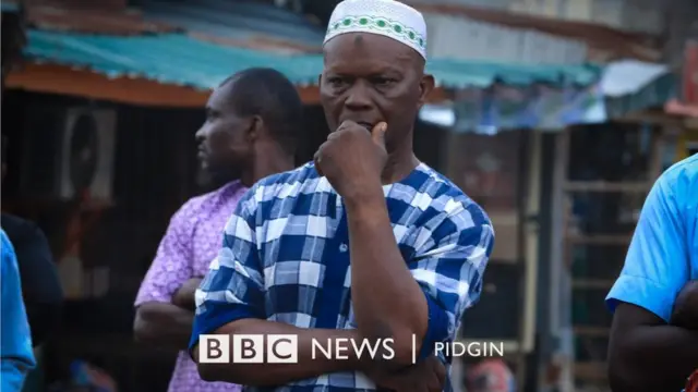 Photo of man wey dey sad