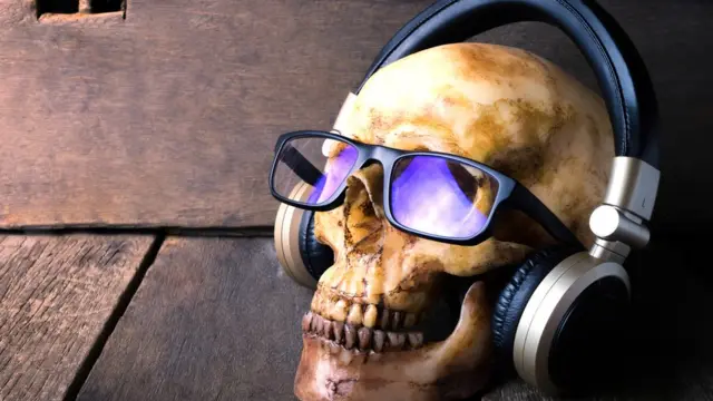 Calavera con audifonos