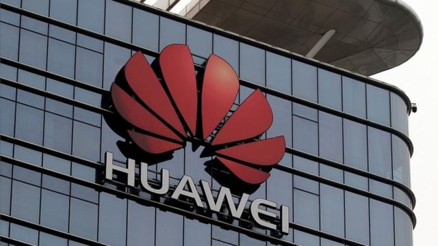 The Huawei logo is pictured outside its Huawei"s factory campus in Dongguan, Guangdong province, China March 25, 2019