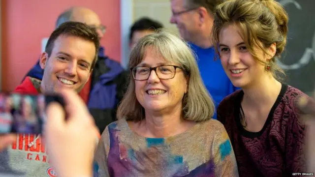 Donna Strickland, Associate Professor at the University of Waterloo and winner of the 2018 Nobel Prize in Physics poses for a photo during a celebration with colleagues and students in Waterloo, Ontario on October 2, 2018