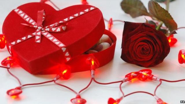 Heart shaped box and a rose