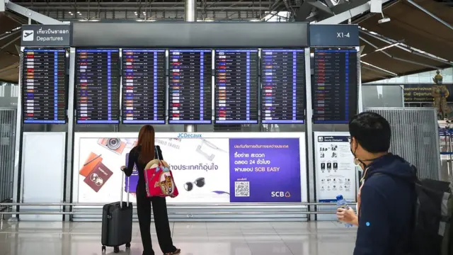 Penumpang di Suvarnabhumi International Airport in Bangkok, Thailand