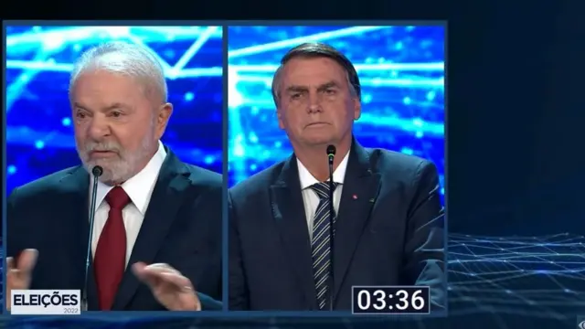 Lula e Bolsonaro durante debate