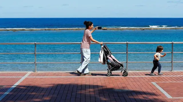 Mother and child on promenade, Gran Canaria, Spain
