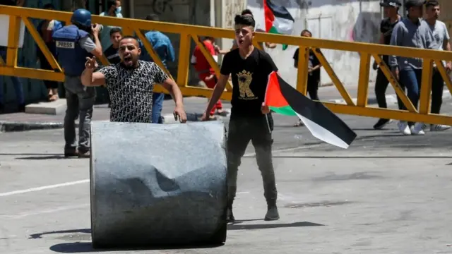 Des Palestiniens manifestent en Cisjordanie occupée.