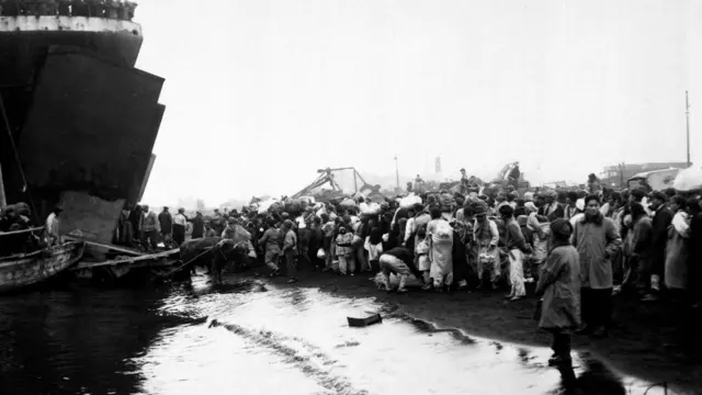 Os refugiados se juntaram no portoroleta de bingo para comprarHungnamroleta de bingo para comprardezembroroleta de bingo para comprar1950