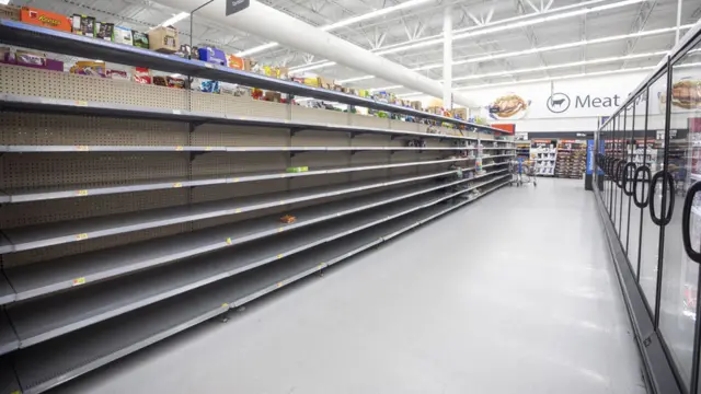 The bread aisle at Walmart is empty two days before Hurricane Florence is expected to strike Wilmington, North Carolina