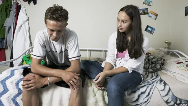 girl and boy talking