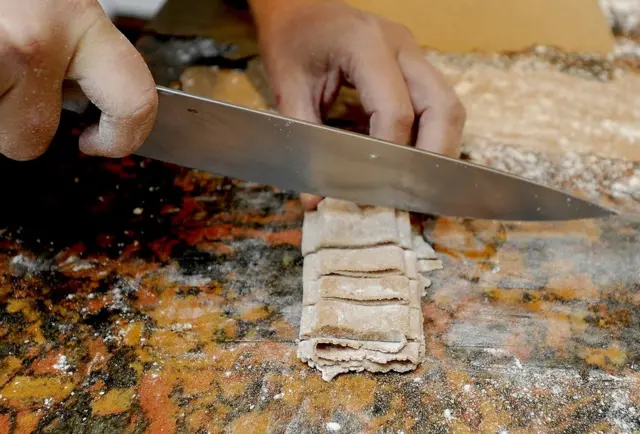 Making noodles from acorn flour in the US