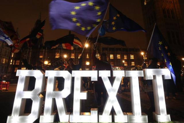 Protesters during a Best for Britain Brexit lights rally outside Parliament in London