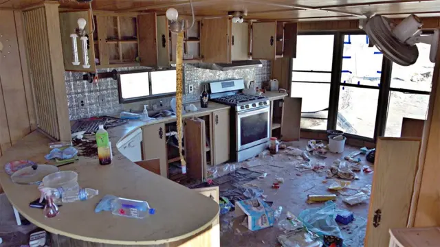 Police raids left many trailer homes abandoned at various cannabis farms in Shiprock, New Mexico