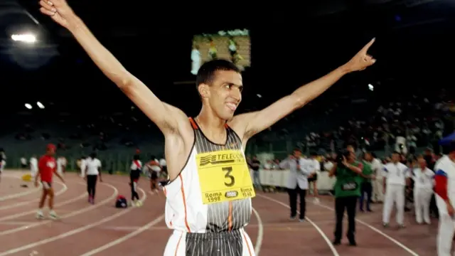 Hicham El Guerrouj of Morocco celebrates after winning the Mens 1500 metres event during the IAAF Golden League Golden Gala at the Olympic Stadium in Rome