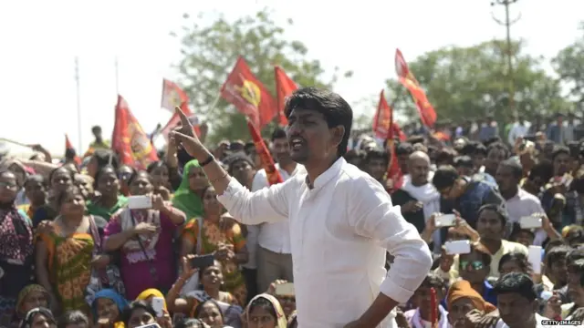 Alpesh Thakor (C) speaks to supporters, as police block demonstrators from protesting at the Tata Nano production plant in Sanand Taluka, some 50 kms from Ahmedabad, on February 23, 2017.