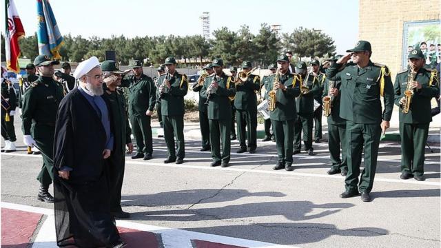 Iranian President Hassan Rouhani (L) attends the 21st Nationwide Assembly of the Islamic Revolution Guards Corps (IRGC) Commanders in Tehran, Iran on September 15, 2015.