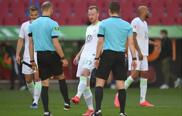 Wolfsburg players kicked boots with the officials afterwards