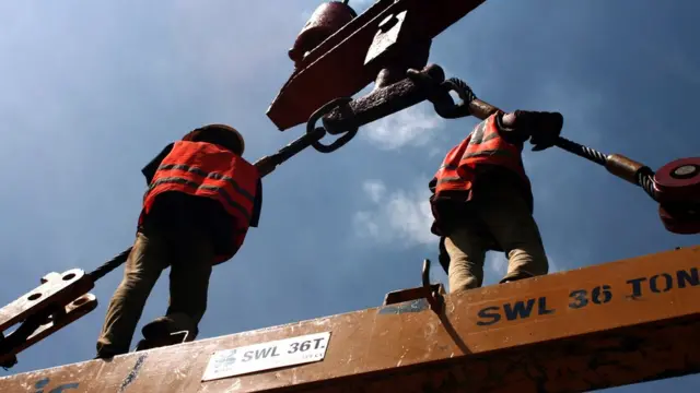 কাজ চলছে চট্টগ্রাম বন্দরের ডকইয়ার্ডে