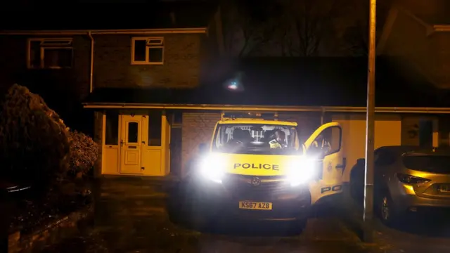 Police outside a house in Salisbury that is believed to be the home of Sergei Skripal