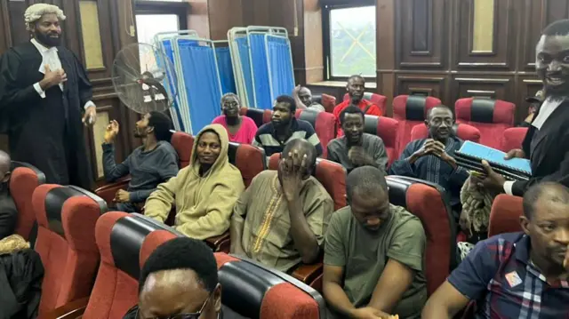 Cross section of di accused as dem dey inside court