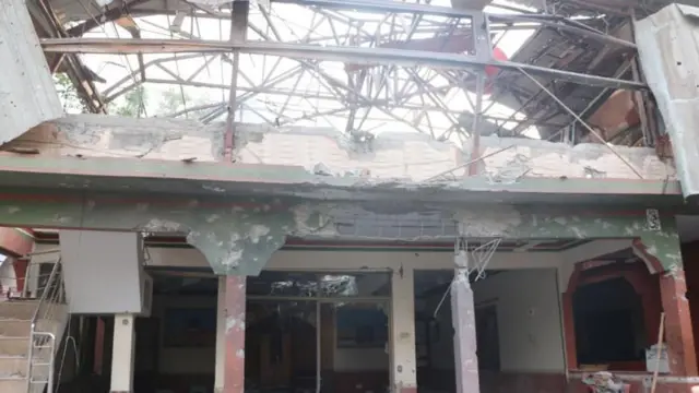Ruins remain of the Bilal Mosque in Muzaffarabad, the capital of Pakistan-administered Kashmir