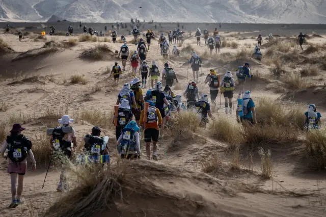 The Marathon des Sables is often described as one of the world's toughest footraces (Credit: Getty Images)