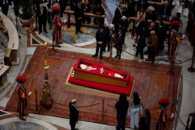 Faithful pay dia respects as di body of Pope Francis lie in state inside St. Peter's Basilica for Vatican City - 24 April 2025