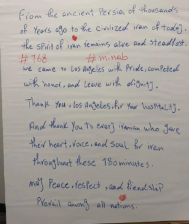 白い紙に青色インクで英語の文字が書かれている。「＃168」、「＃minab」と、ハートマークは赤色インクで描かれている。