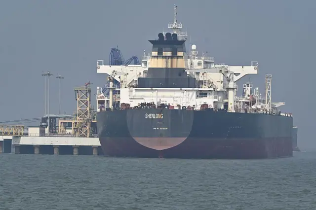 The Liberia-flagged Suezmax tanker Shenlong, carrying crude oil, among the first ships to reach India amid the Middle East crises, is seen at Mumbai Port 