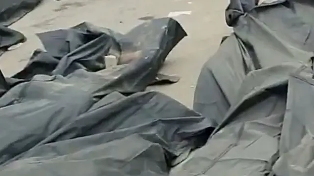 Black body bags outside Kahrizak Forensic Medical Centre, in this screen grab from a video obtained from social media on 11 January 2026. 