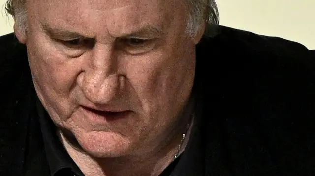 French actor Gerard Depardieu looks on as he returns to the courtroom after a break on the fourth day of his trial in which he is charged with sexually assaulting two women during a film shoot in 2021, at the Paris criminal court in the Tribunal de Paris courthouse, on March 27, 2025.