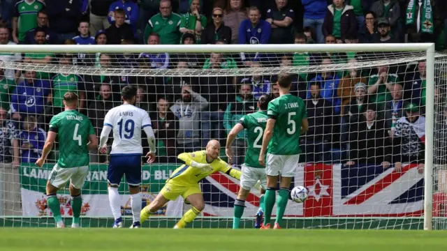 The goalkeeper has represented Northern Ireland from youth level to the senior team