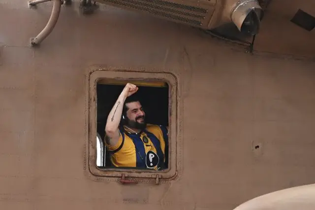 Gaza hostage Ziv Berman celebrates from a helicopter as he arrives at Chaim Sheba Medical Center at Tel HaShomer on October 13, 2025 in Ramat Gan, Israel. 