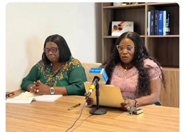 Barile Nwakoh in pink blouse and Emilia Amadi in green dress