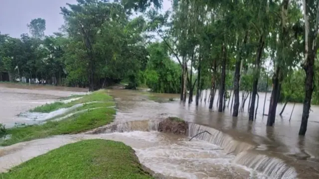 Road destroyed by flood waters (file photo)