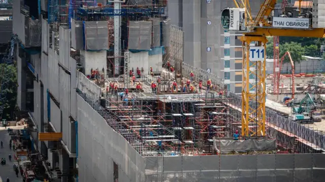 BANGKOK, THAILAND - 2023/07/05: Construction workers are seen working on the site of 11 Cloud Project under construction, a $1.1 billion hub for content