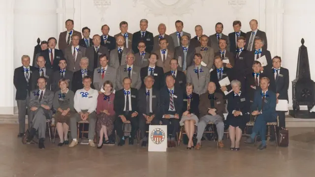 Una foto de grupo con líderes mundiales.